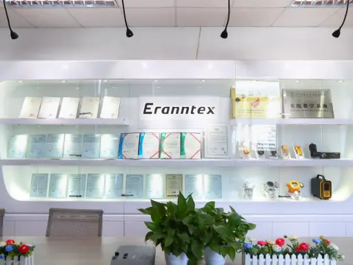 Showroom shelves holding company certificates and instruments under the Eranntex name
