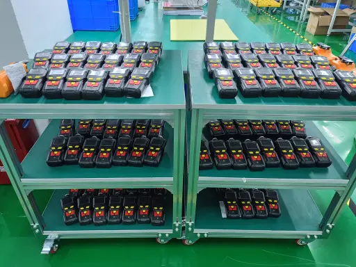 Carts holding a batch of finished portable gas detectors
