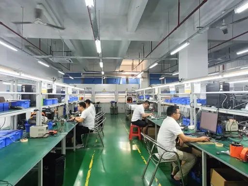 Eranntex production floor with assembly benches and staff at work, March 2026