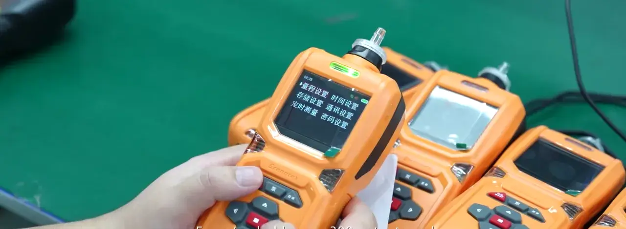 Portable gas detectors being checked on an assembly bench