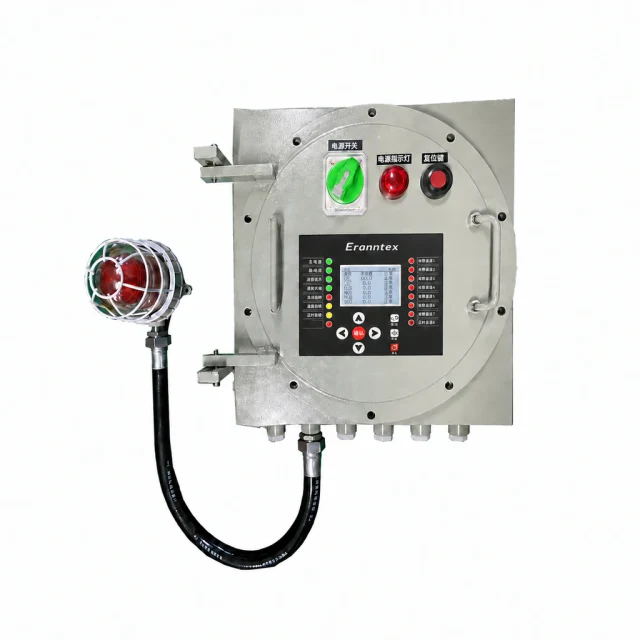 Eranntex MIC-1000-Ex gas alarm controller with an LCD, status indicators, navigation keys, circular flanged enclosure and external alarm beacon.